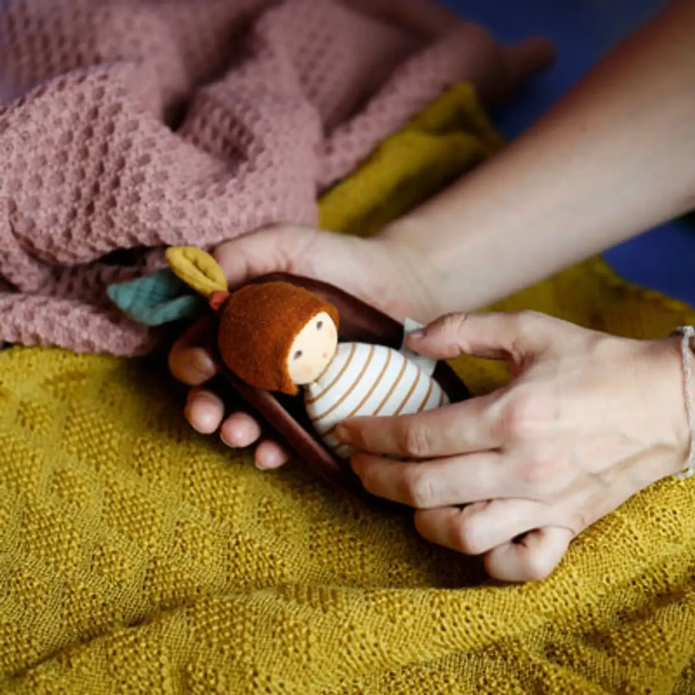 Little Oak Baby Rattle In Bed